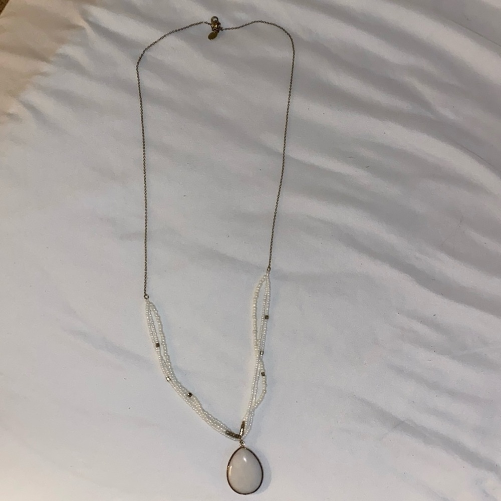Long white pearl pendant necklace with white beads and gold chain